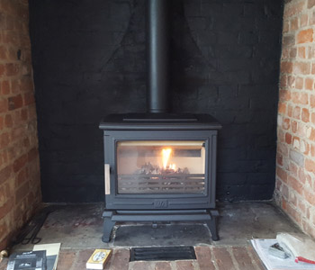 ACR Rowandale Multifuel Stove - in matt black. Installed in Shere near Guildford, Surrey